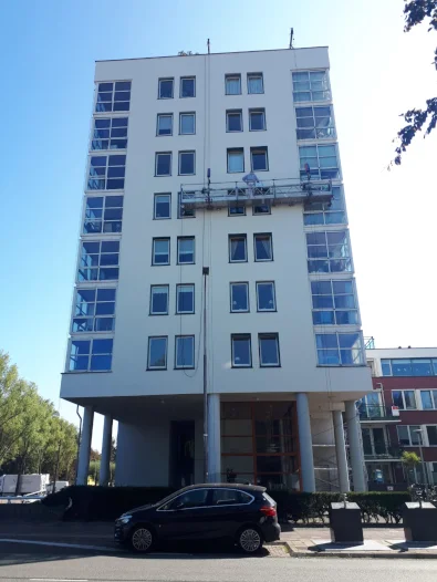 Hangbruginstallatie schilderwerk appartementen complex